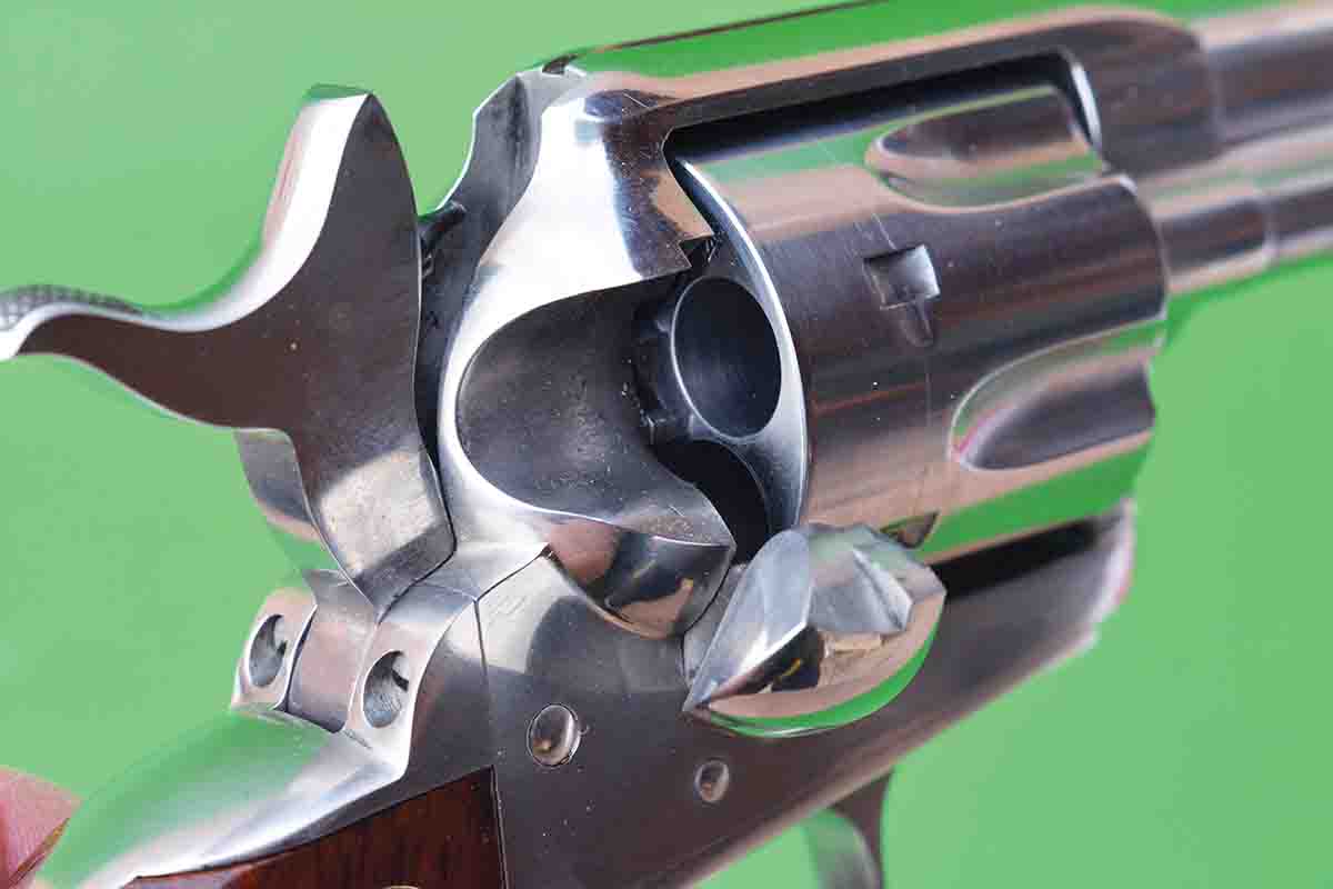 The Cimarron Stainless Frontier features a traditional half-cock hammer position. Note how the chamber aligns correctly with the loading trough.